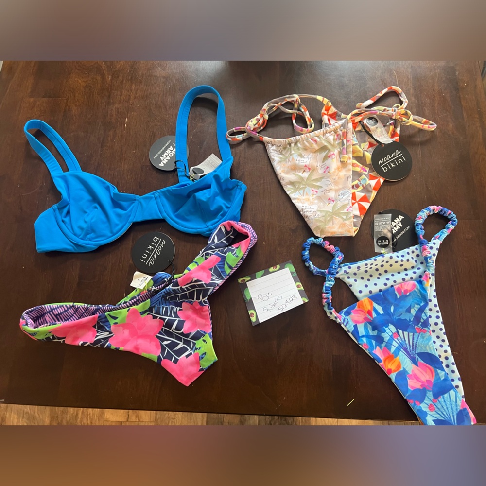 Moana Bikini Top and bottoms NWT all Larges besides the map print is a medium